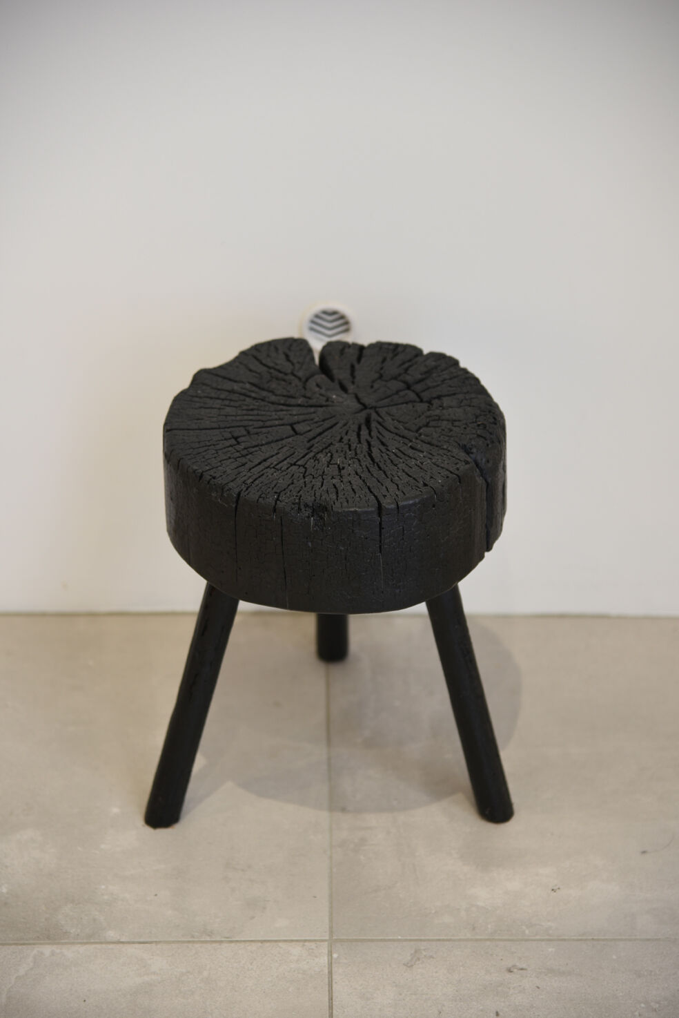 Stool wood finishing shou-sugi-ban in wood burned with treatment