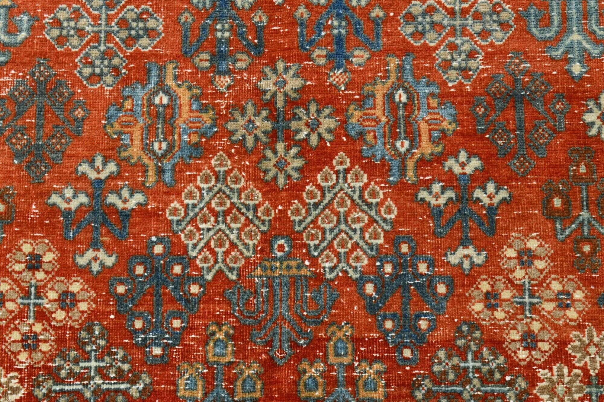 Vintage Turkish rug in brick red and indigo with floral design, 276 × 389 cm