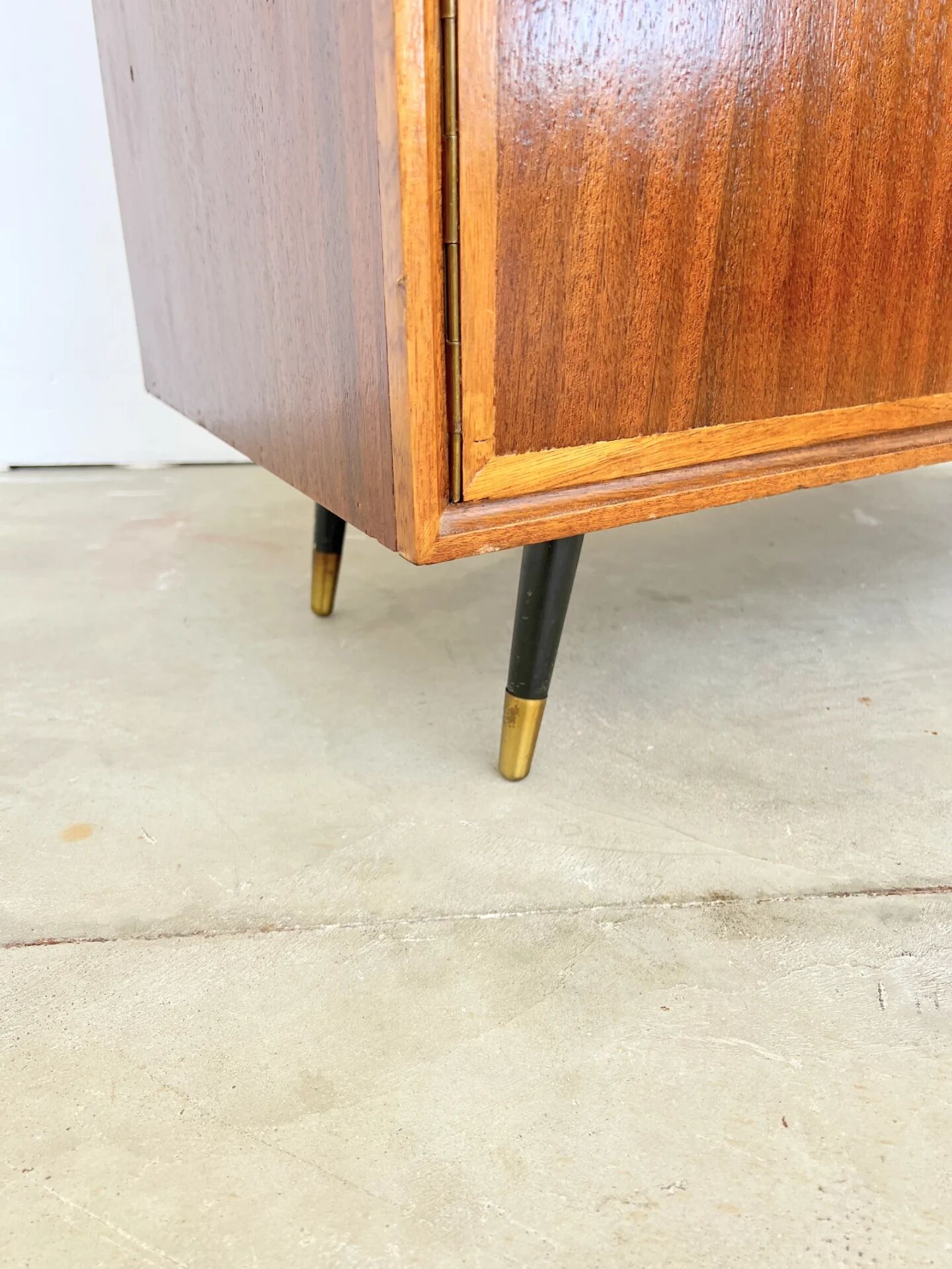 Mahogany library — closed storage and open cubbies, custom-made, 1960s.
