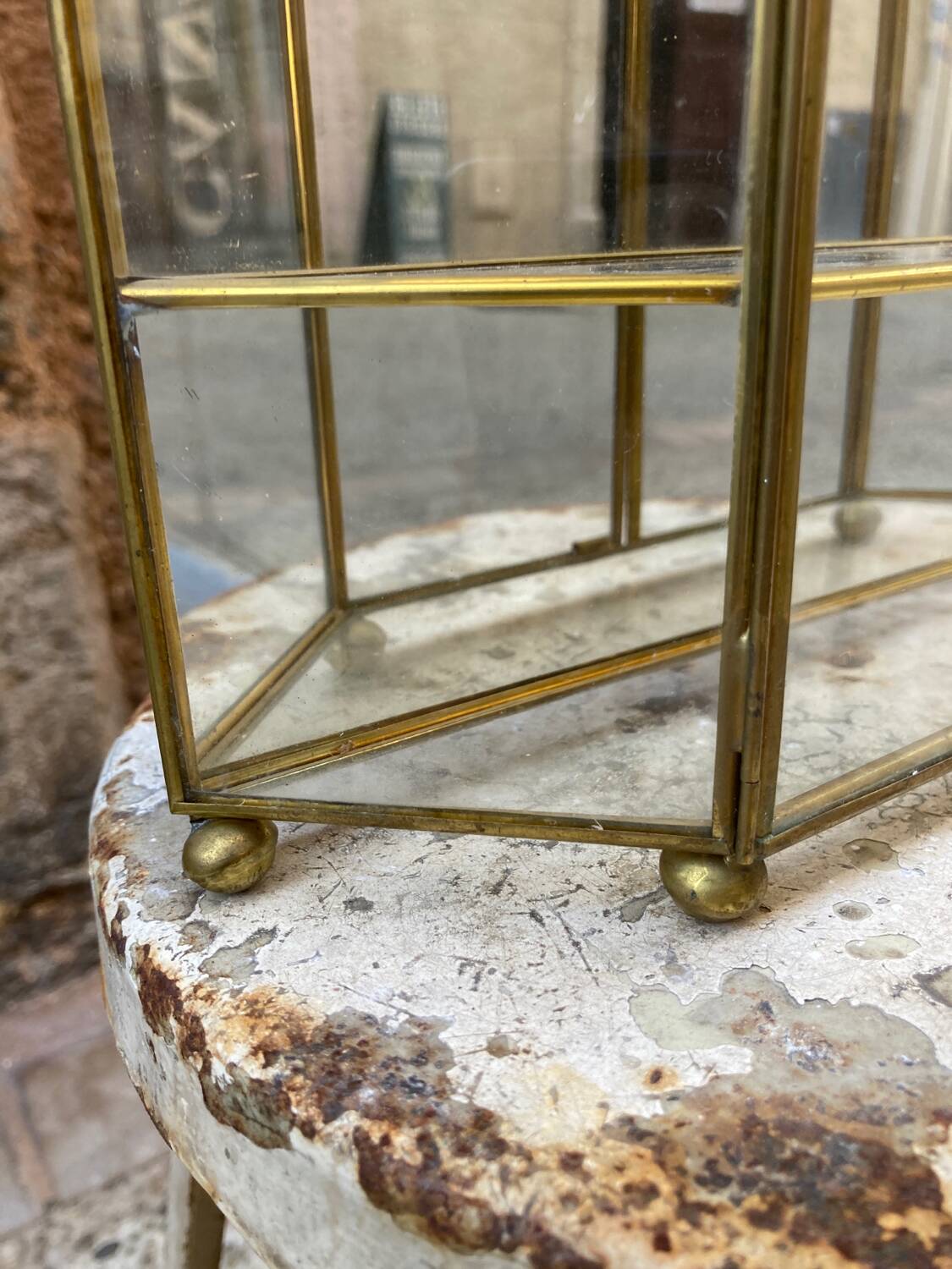 Brass wall display case