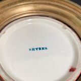 Porcelain vase signed Sèvres on bronze frame