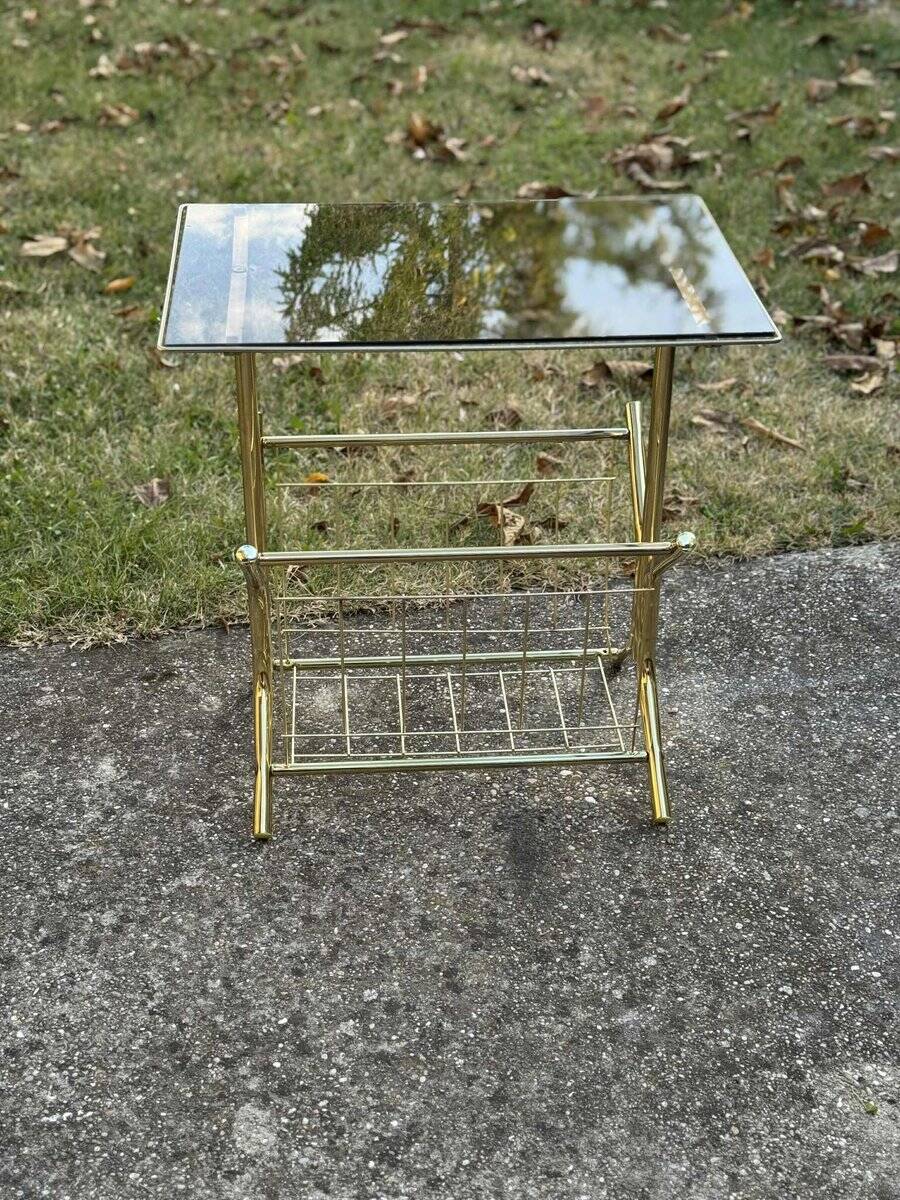 Mid-century modern brass and smoked glass side table with integrated magazine holder, 1970s