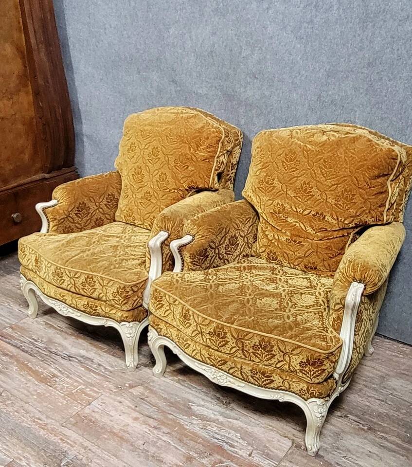 Pair of Louis XV style Bérgères in lacquered wood, 19th century