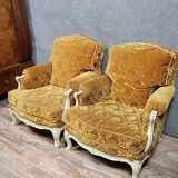 Pair of Louis XV style Bérgères in lacquered wood, 19th century