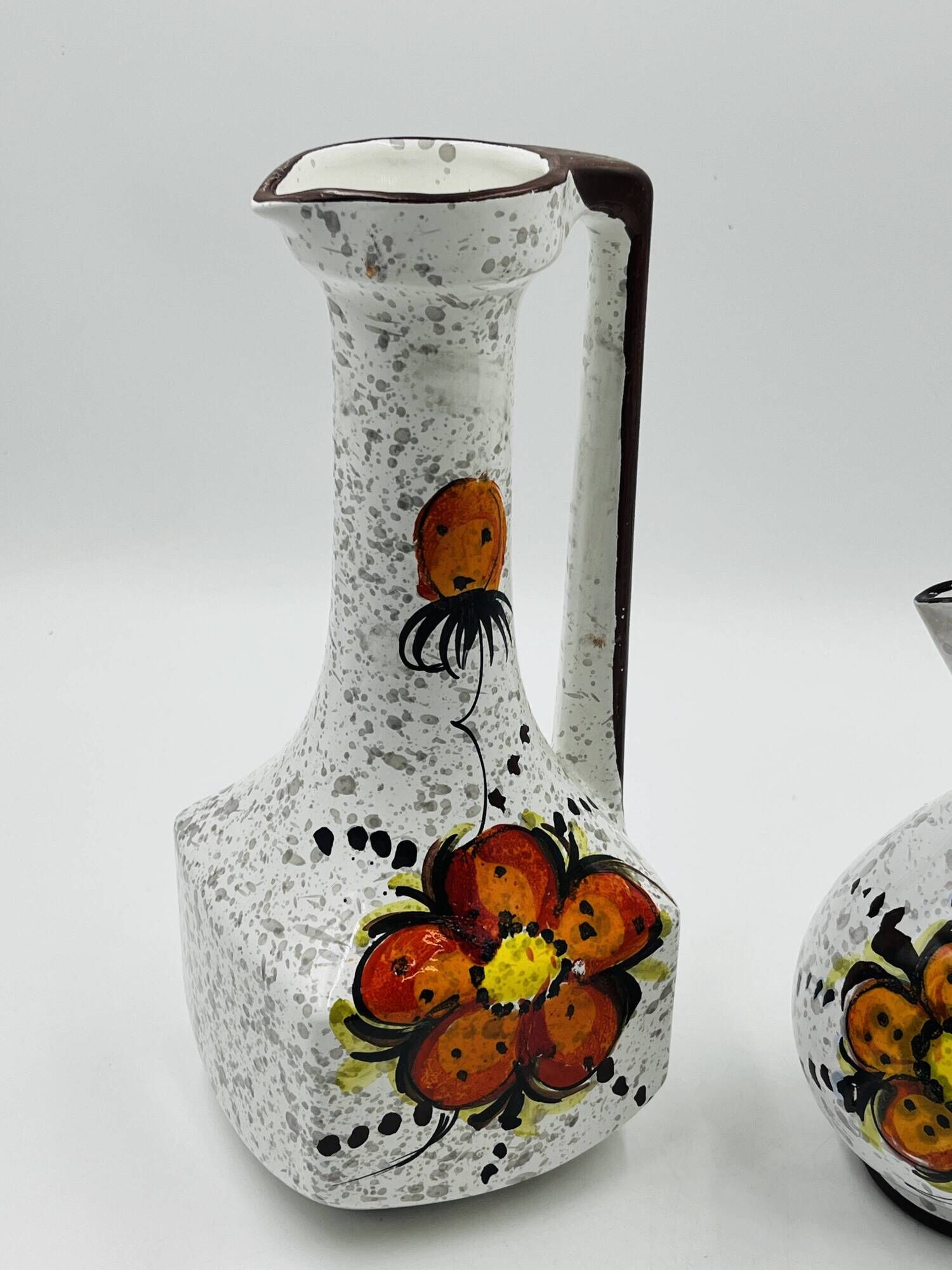 Pair of vintage hand-painted Italian floral vases