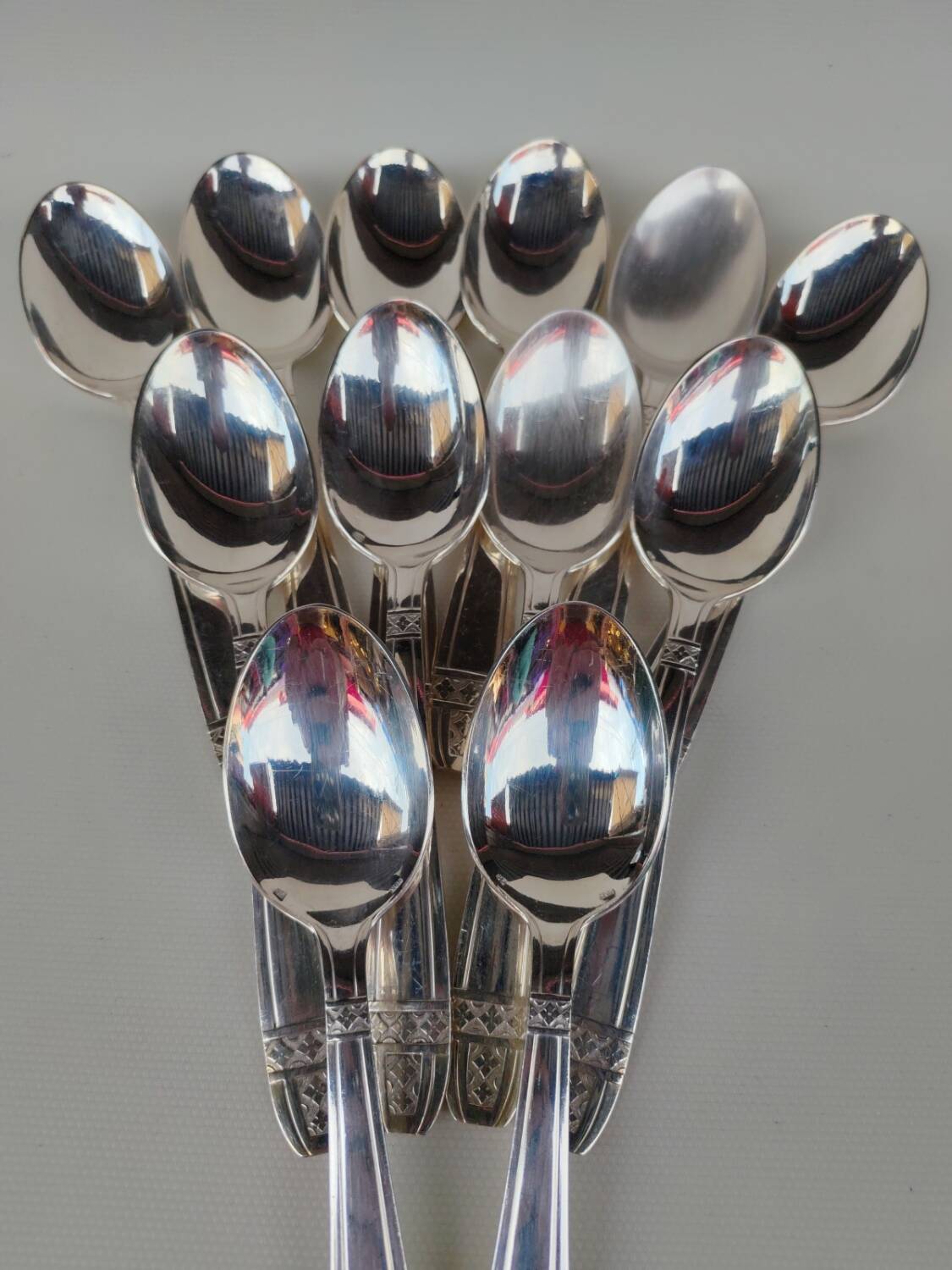 12 silver-plated soup spoons, Monaco Grand Prix model.
