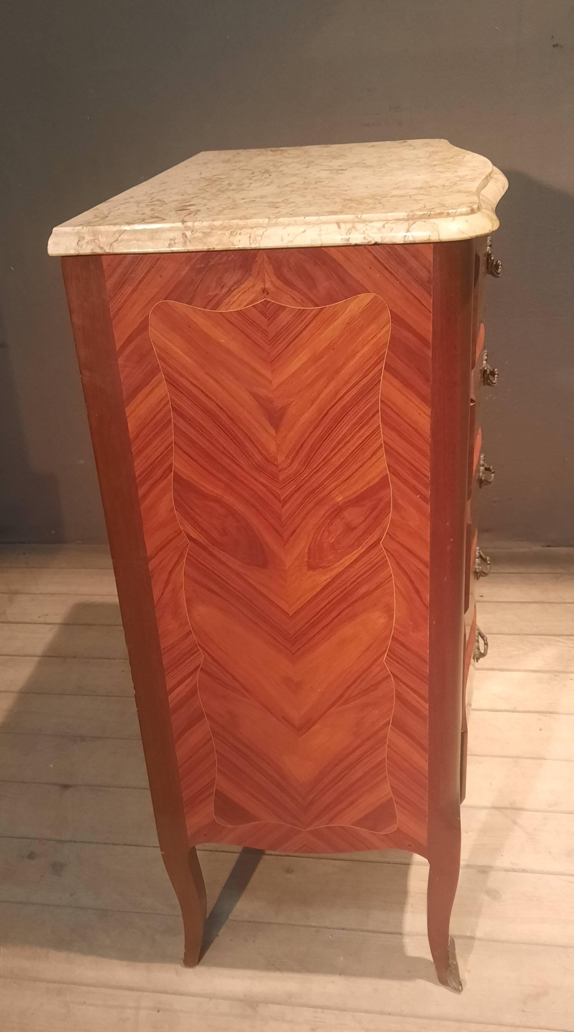 Flowered marquetry commode in Louis XV style