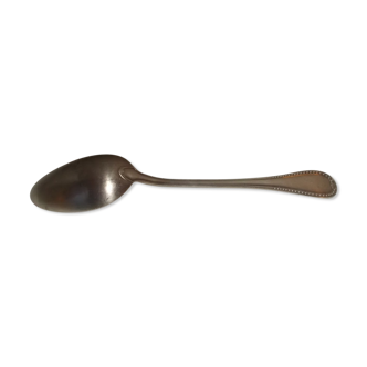Silver metal serving spoon