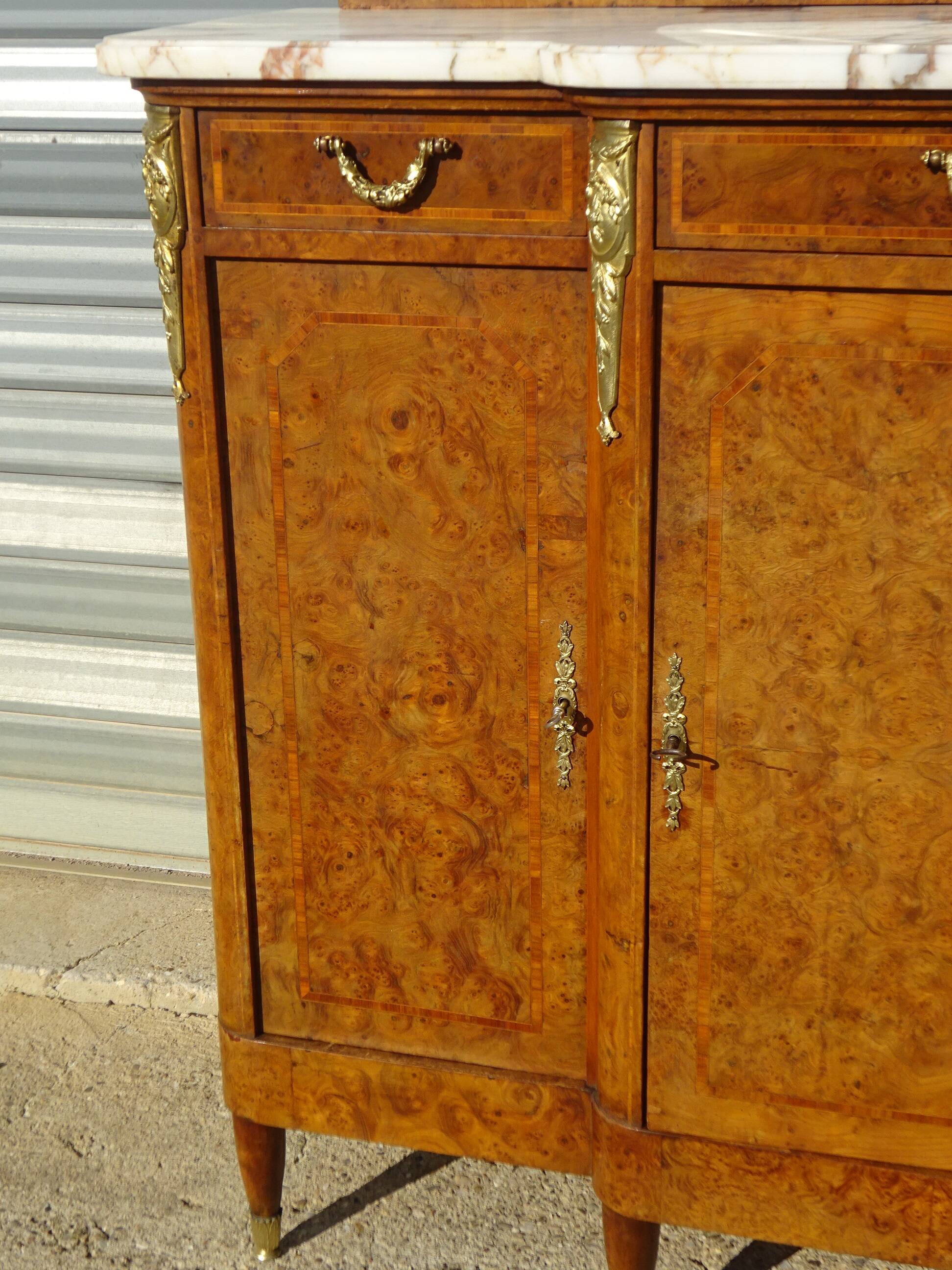 Louis XVI buffet with mirror, marble, and bronze fittings.
