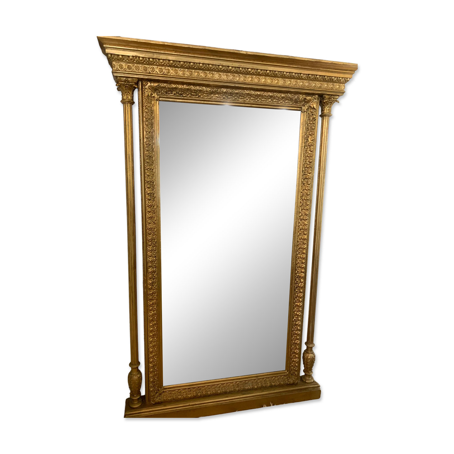 Eclectic 19th-century mirror, carved and gilded wooden frame.