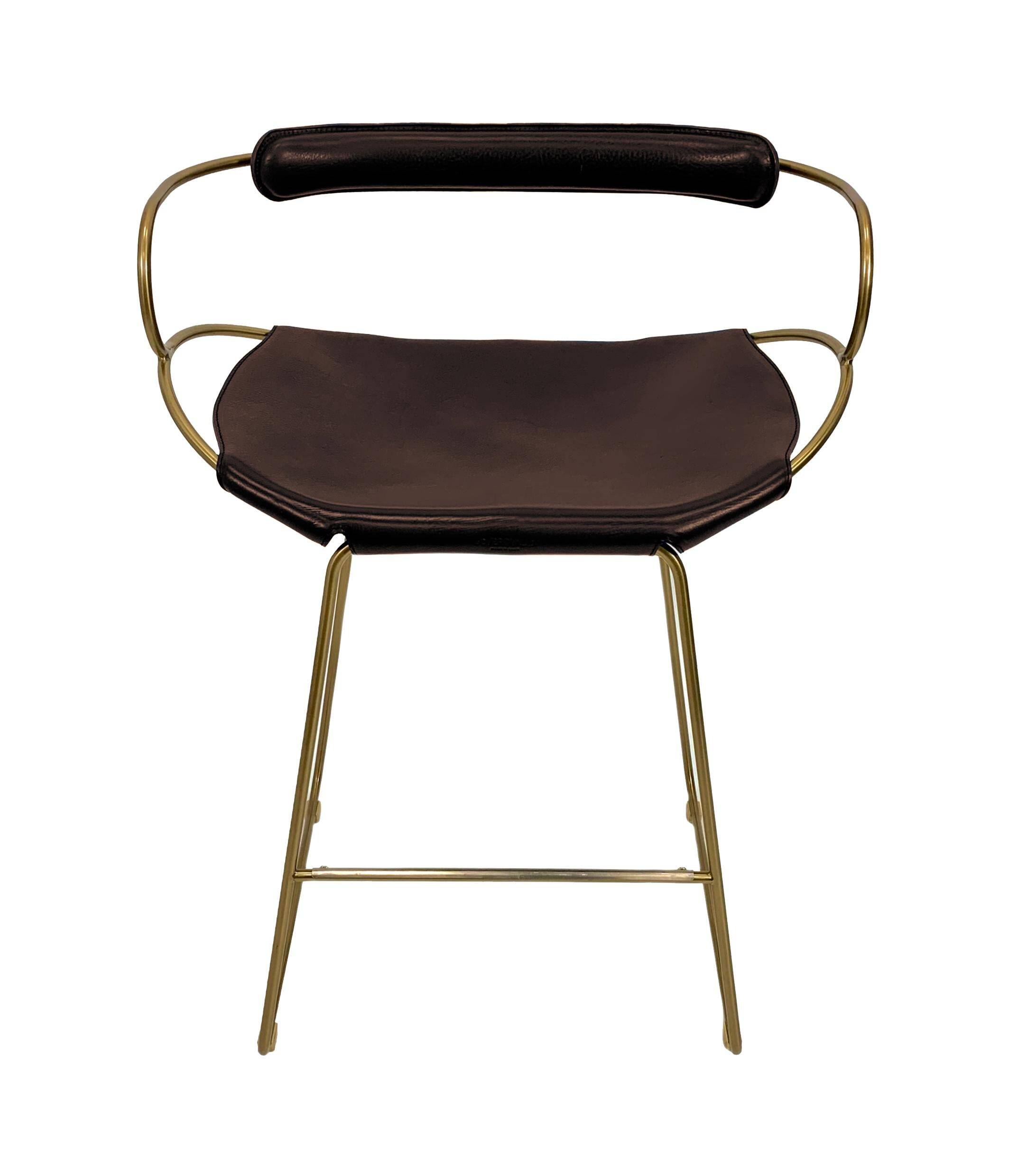 Sculptural bar stool with a brass metal backrest and dark brown leather.