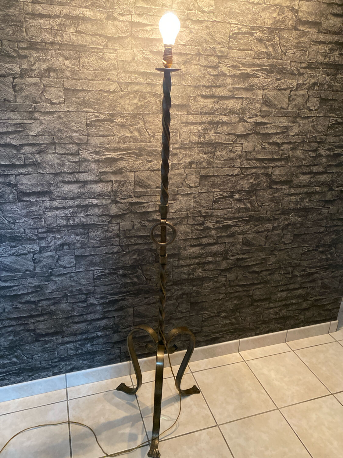 Brutalist floor lamp in twisted iron
