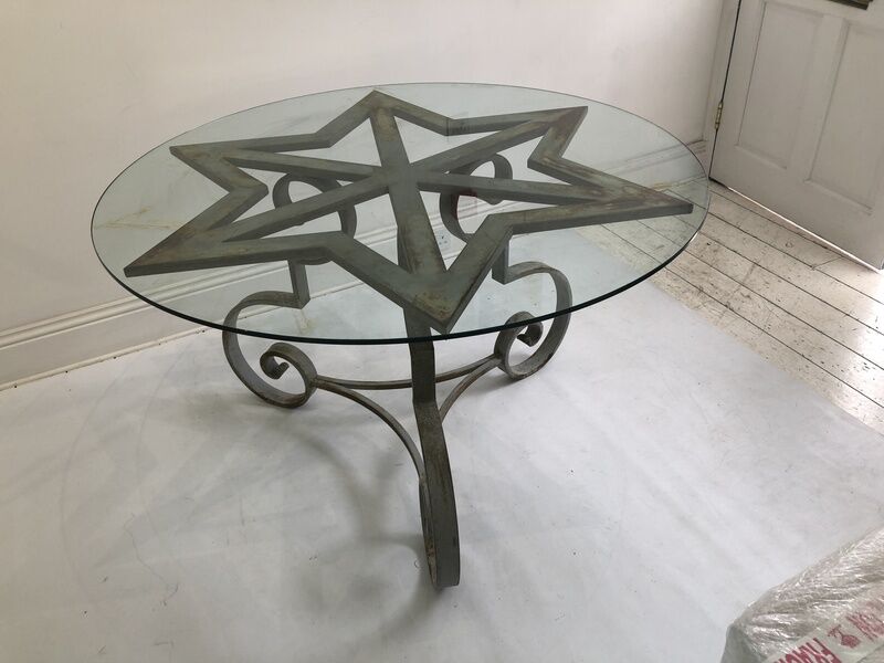 Star shaped cast iron round dining table 1970