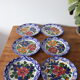 8 hand-painted plates
