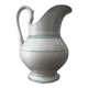 White toilet jug with green trim