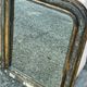 Miroir louis Philipe en bois doré sculpté fronton arrondi