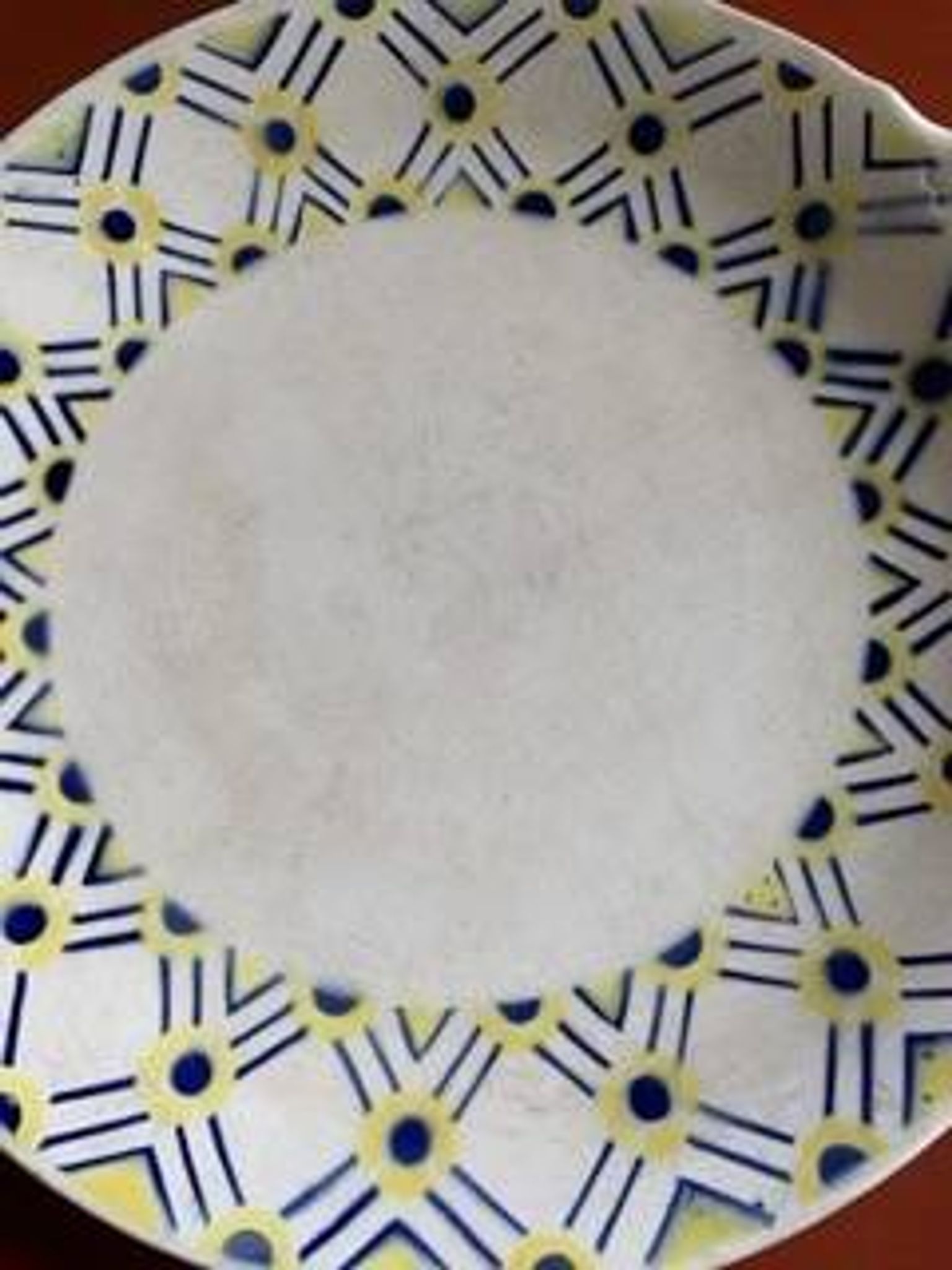 Lot de deux plats en terre de fer années 30