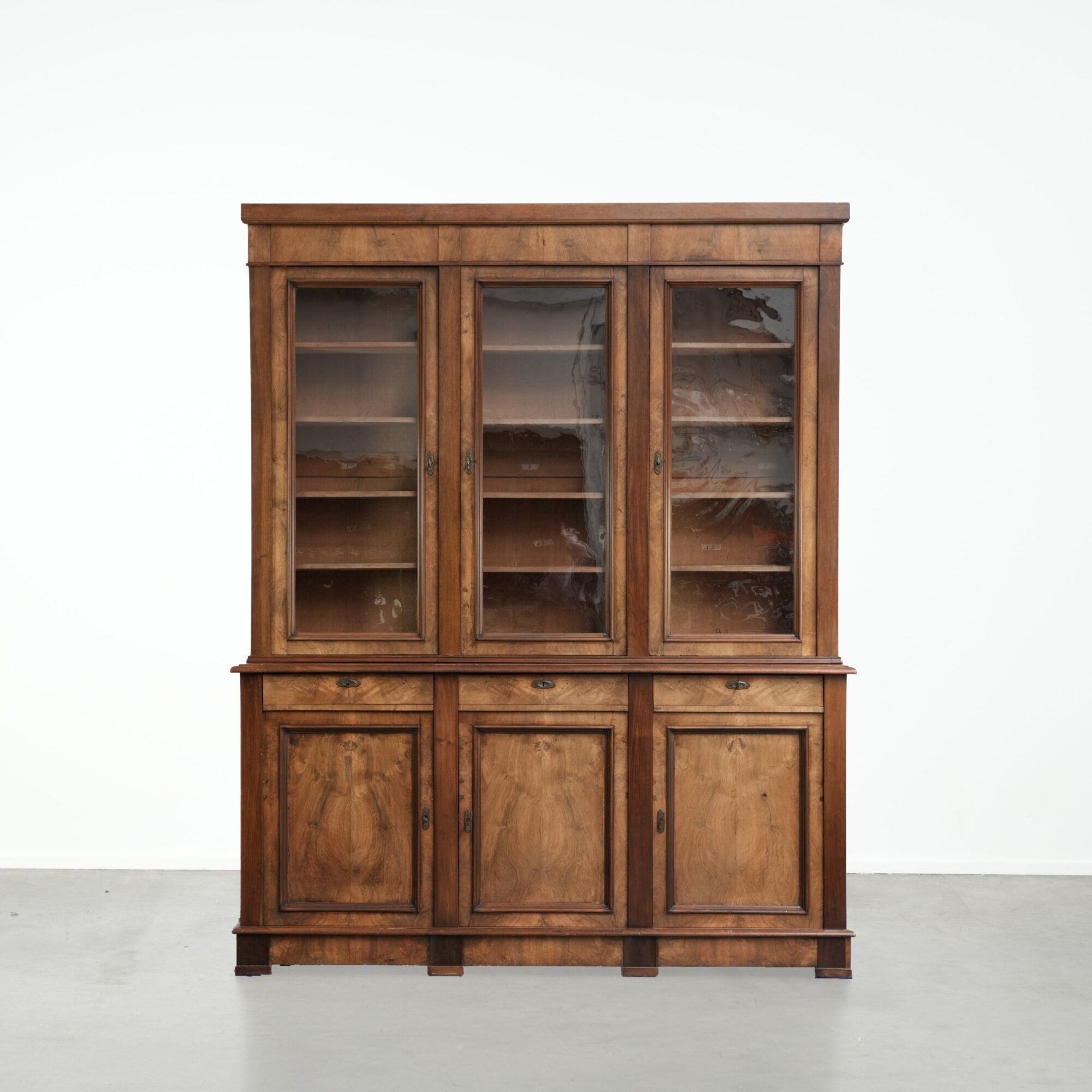 Antique English buffet/bookcase from the 19th century with original glass