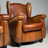 Set of 2 sheepskin club armchairs