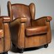 Set of 2 sheepskin club armchairs