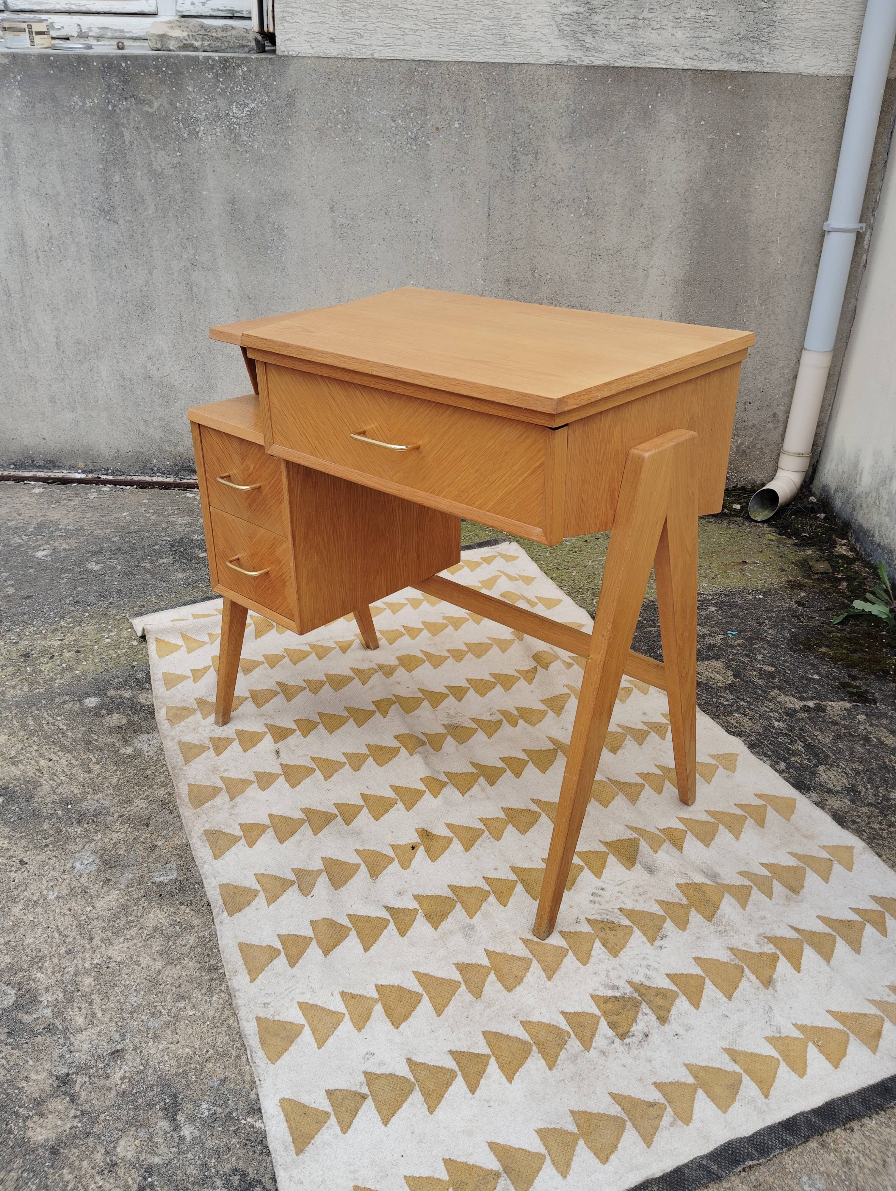 Scandinavian desk based on a Singer piece of furniture.