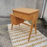 Scandinavian desk based on a Singer piece of furniture.