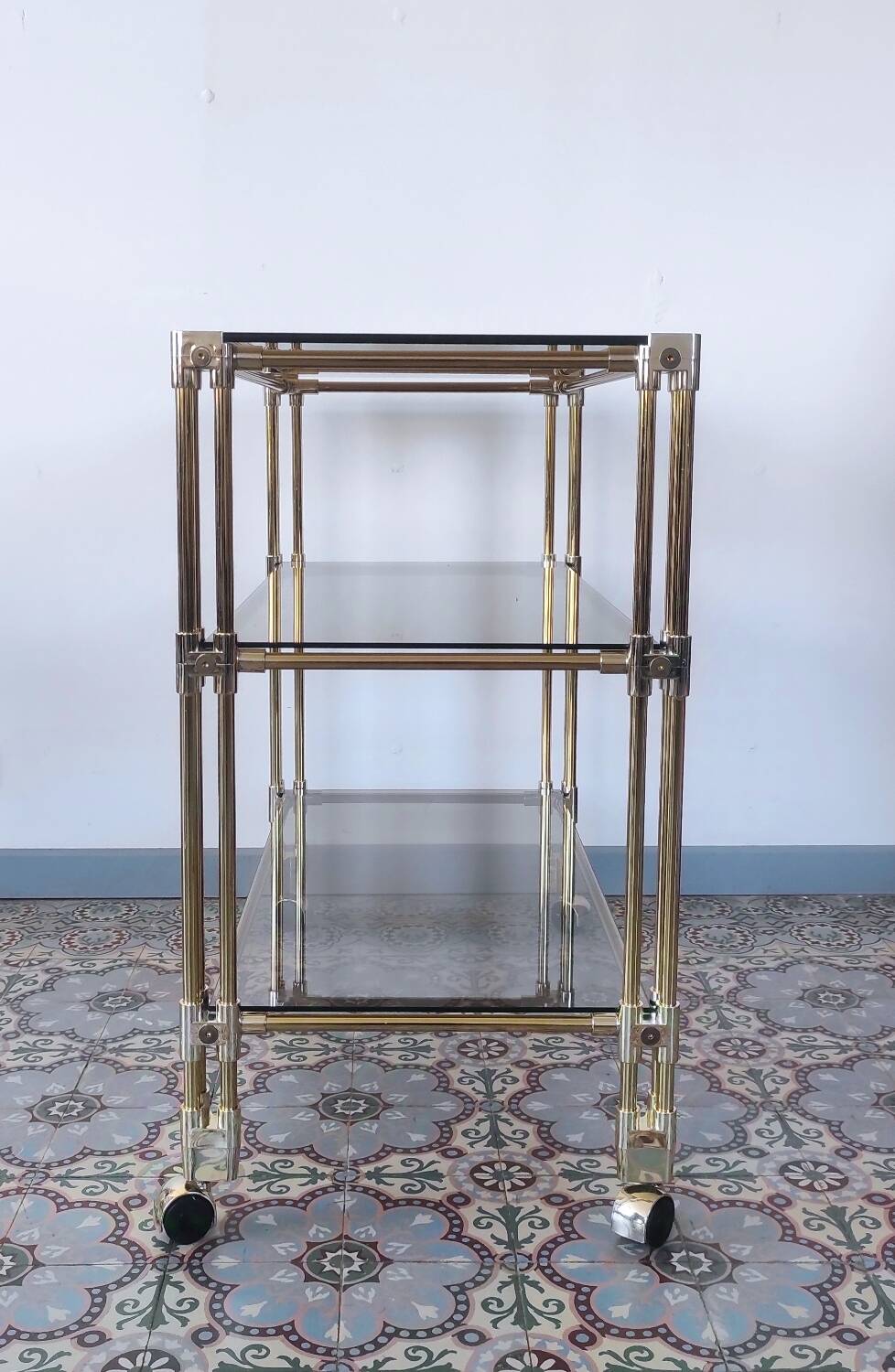 Dessert, vintage gold rolling bar, chrome and smoked glass.