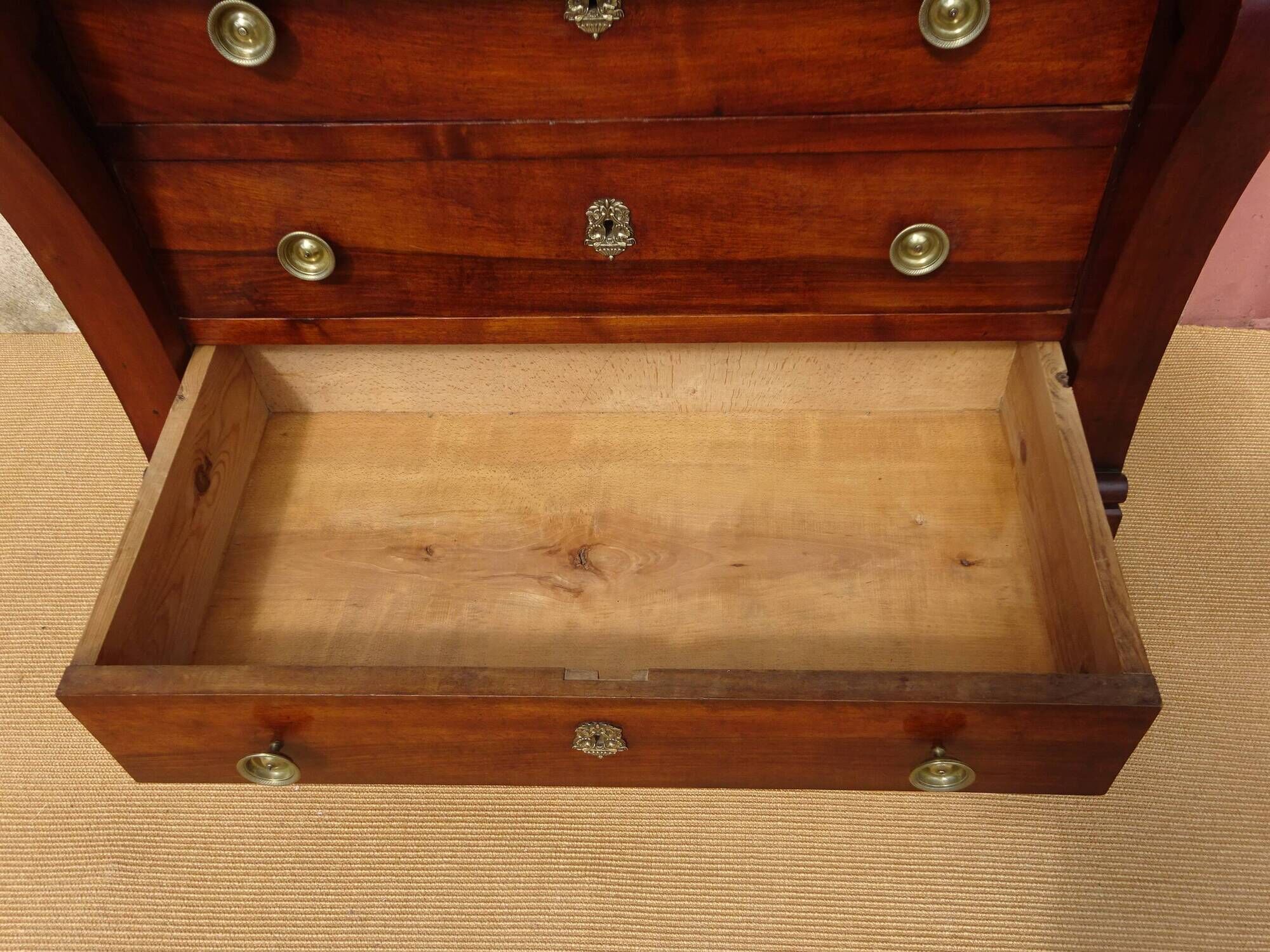 Antique chest of drawers with cross motifs, made entirely of solid walnut.