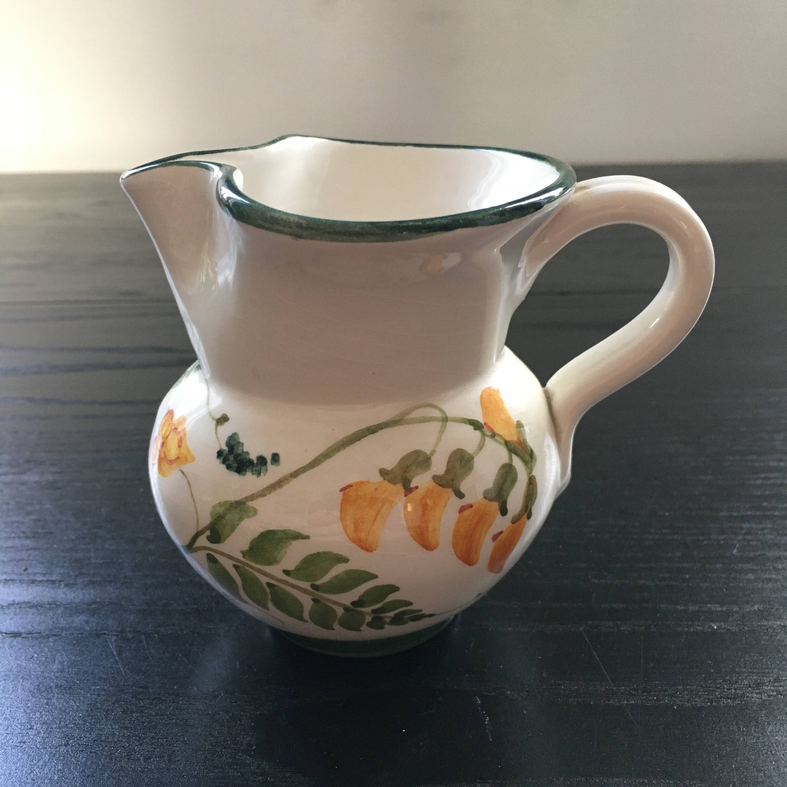 Small pitcher with floral decoration