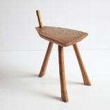 Brutalist tripod stool in carved wood, 1950s