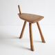 Brutalist tripod stool in carved wood, 1950s