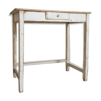 Old table in patinated white wood