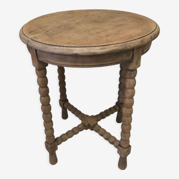 Round wooden side table