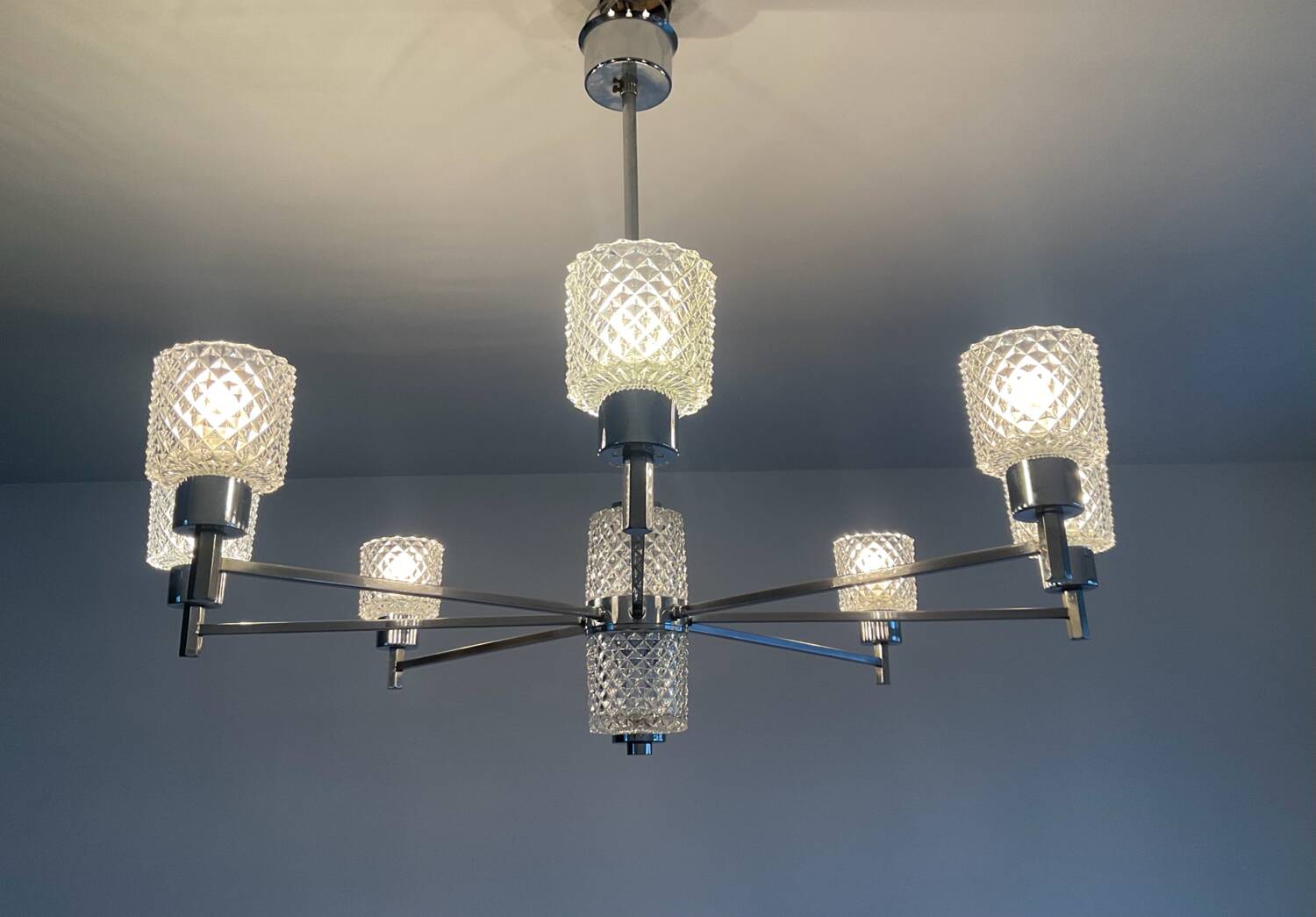 Vintage Italian chandelier from the 60s in chromed metal and glass