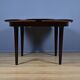 Scandinavian system table in rosewood, 6 to 8 covers – 1960