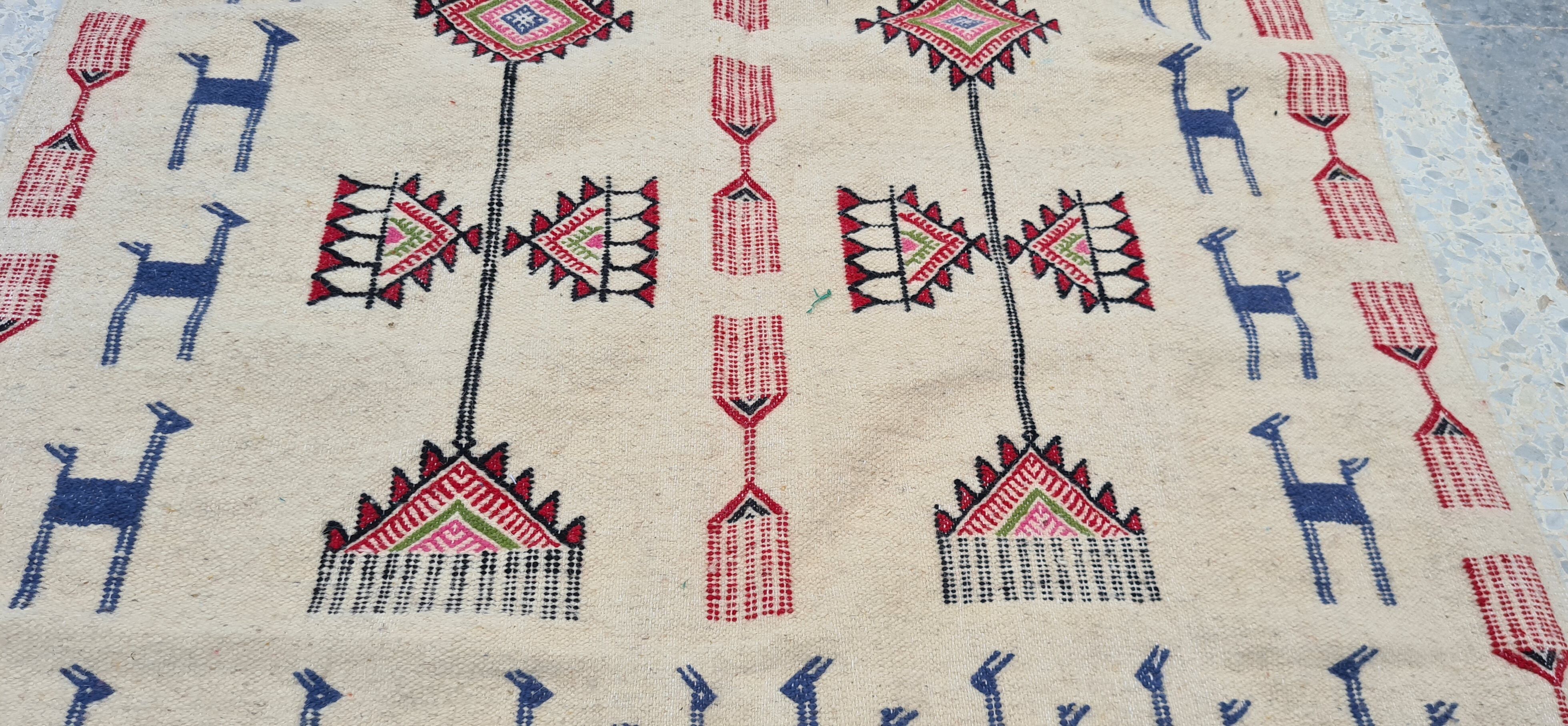 Tapis kilim beige à motifs multicolores fait main en pure laine