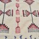 Tapis kilim beige à motifs multicolores fait main en pure laine
