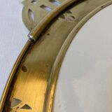 Art Nouveau plate in earthenware with a brass frame