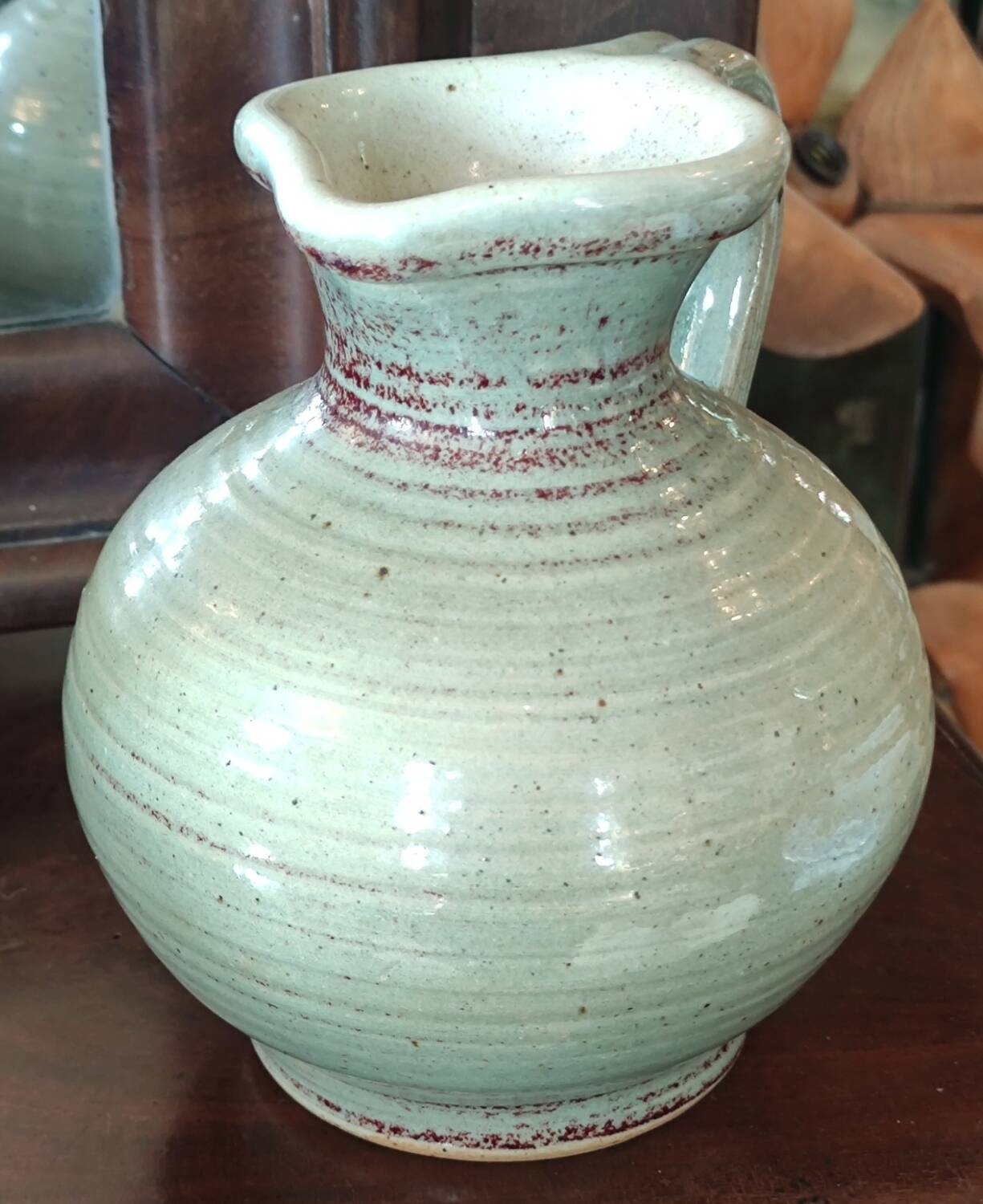 Old small glazed ceramic pottery pitcher