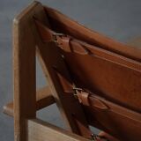 Pair of oak and leather hunting chairs by Kurt Østervig, modern Danish style from the 1960s.