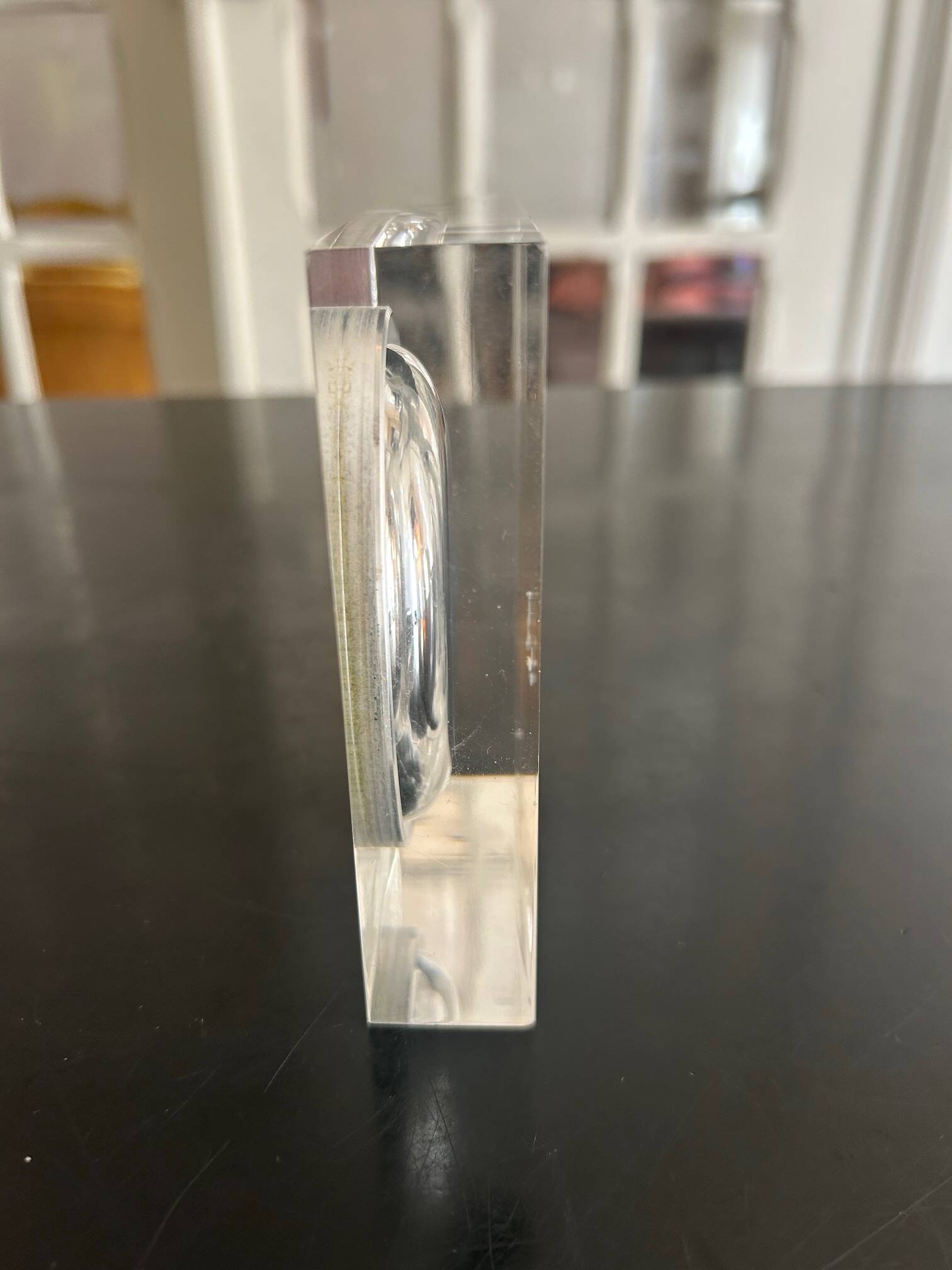 Plexiglass pocket emptier 1970