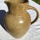 Beige handcrafted speckled sandstone pitcher