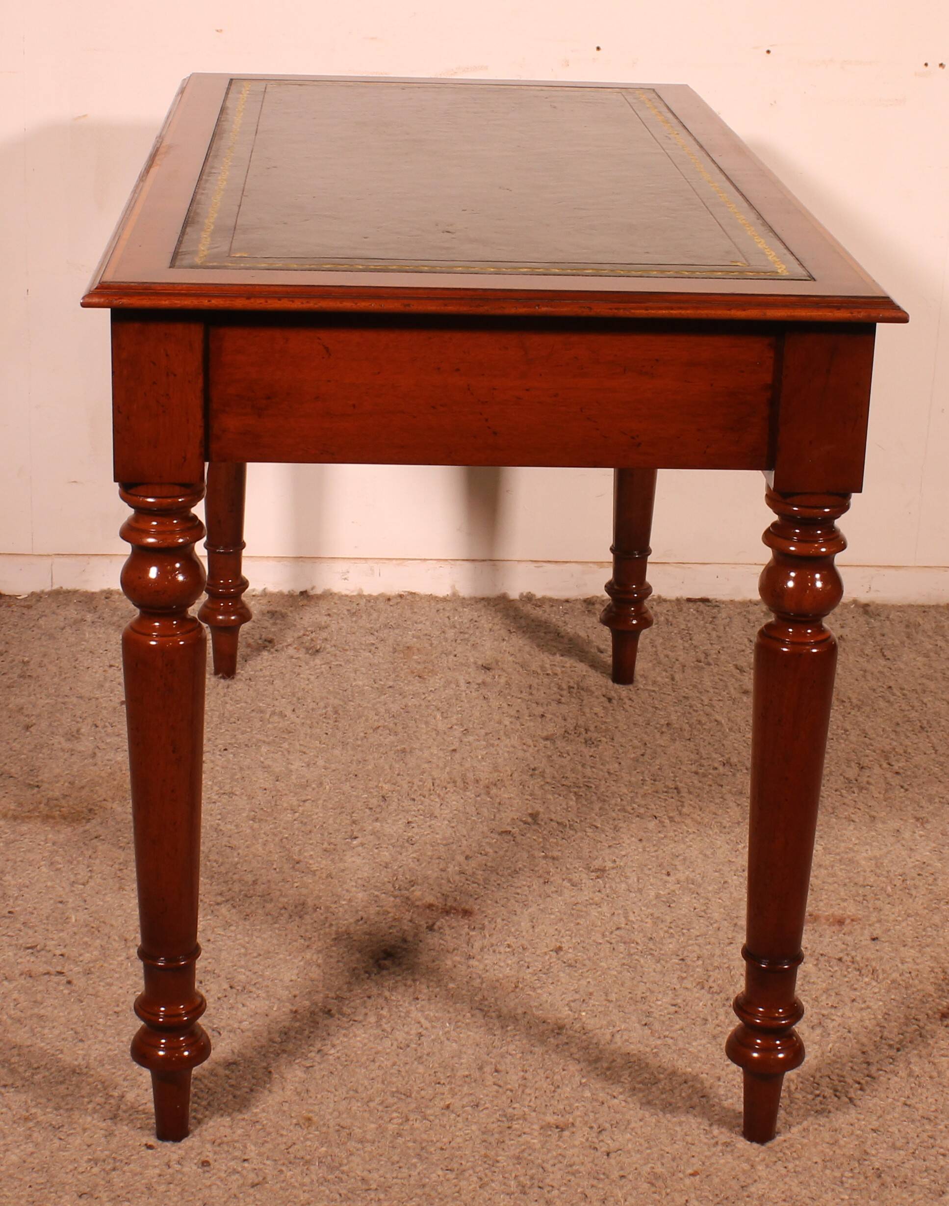 flat desk with two drawers from the 19th century in mahogany and inlays