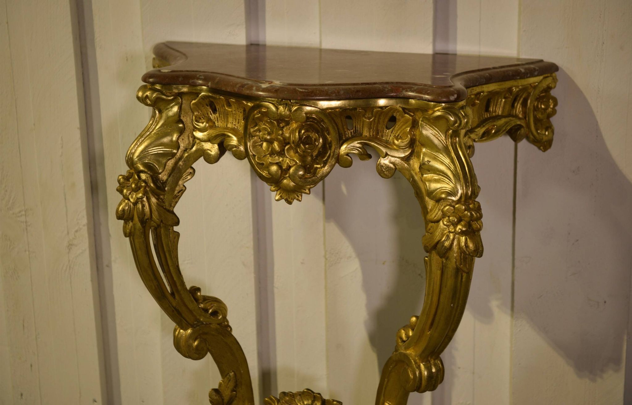 Golden wood and marble console, 19th century.