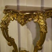 Golden wood and marble console, 19th century.