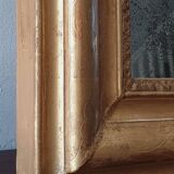 Old gilded mirror and old mercury glass - wall mirror with gold leaf