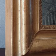Old gilded mirror and old mercury glass - wall mirror with gold leaf