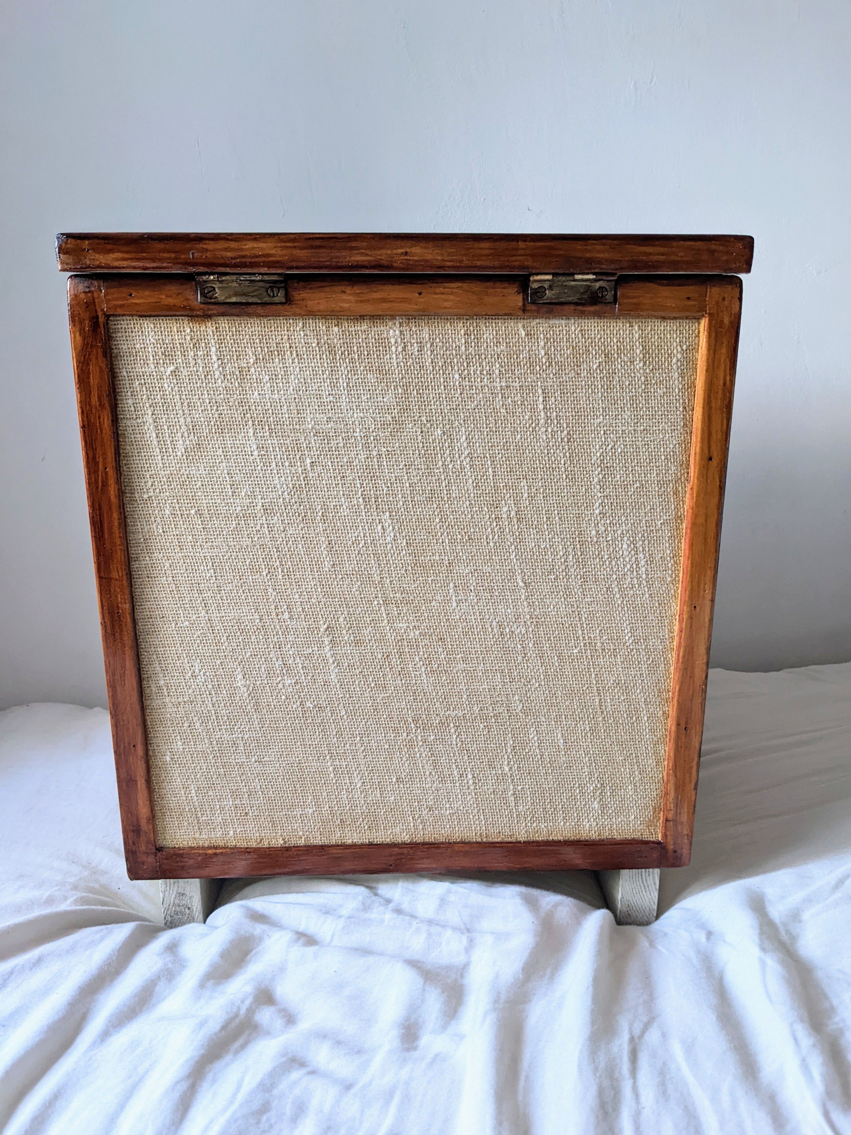 Burlap chest and varnished wood