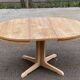 Scandinavian Baumann round extendable dining table with central leg, 115cm.