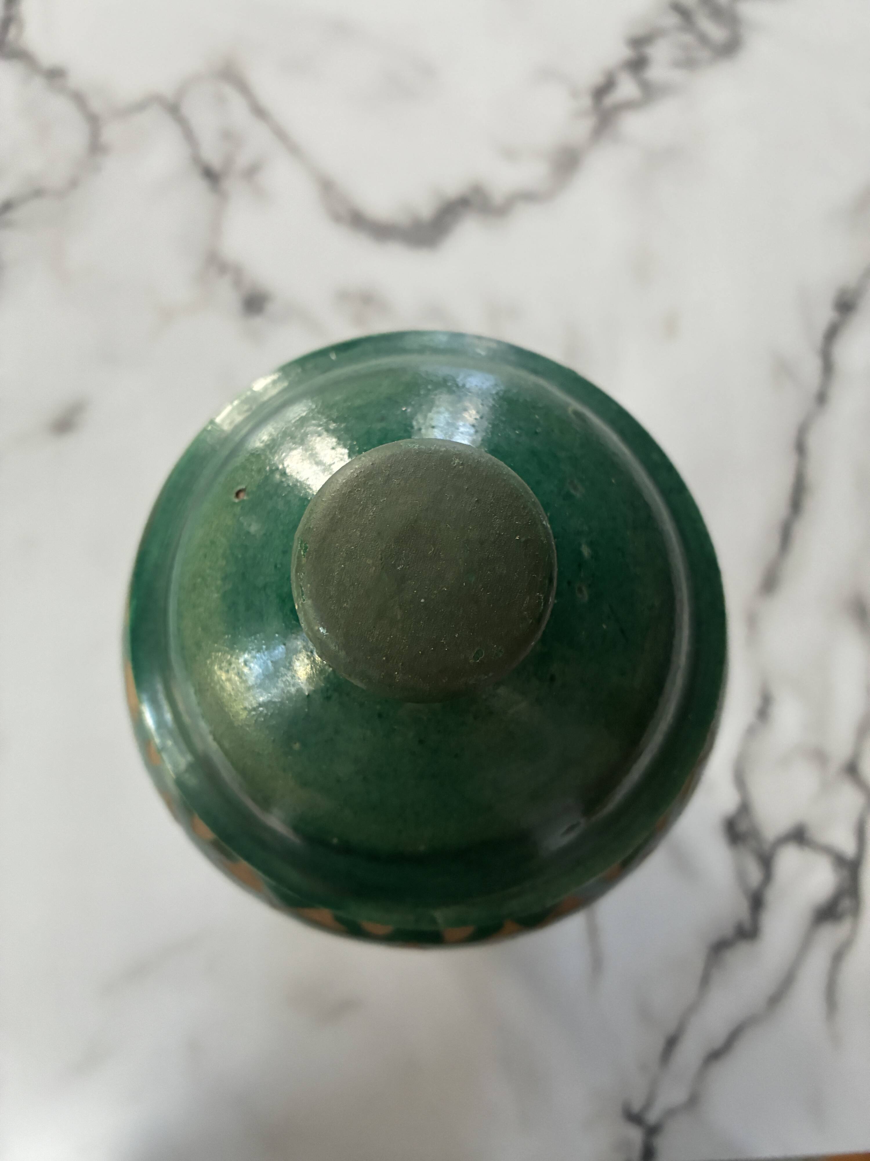 Sculpted terracotta pot